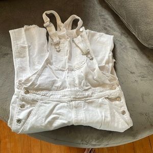 American eagle white ripped overalls